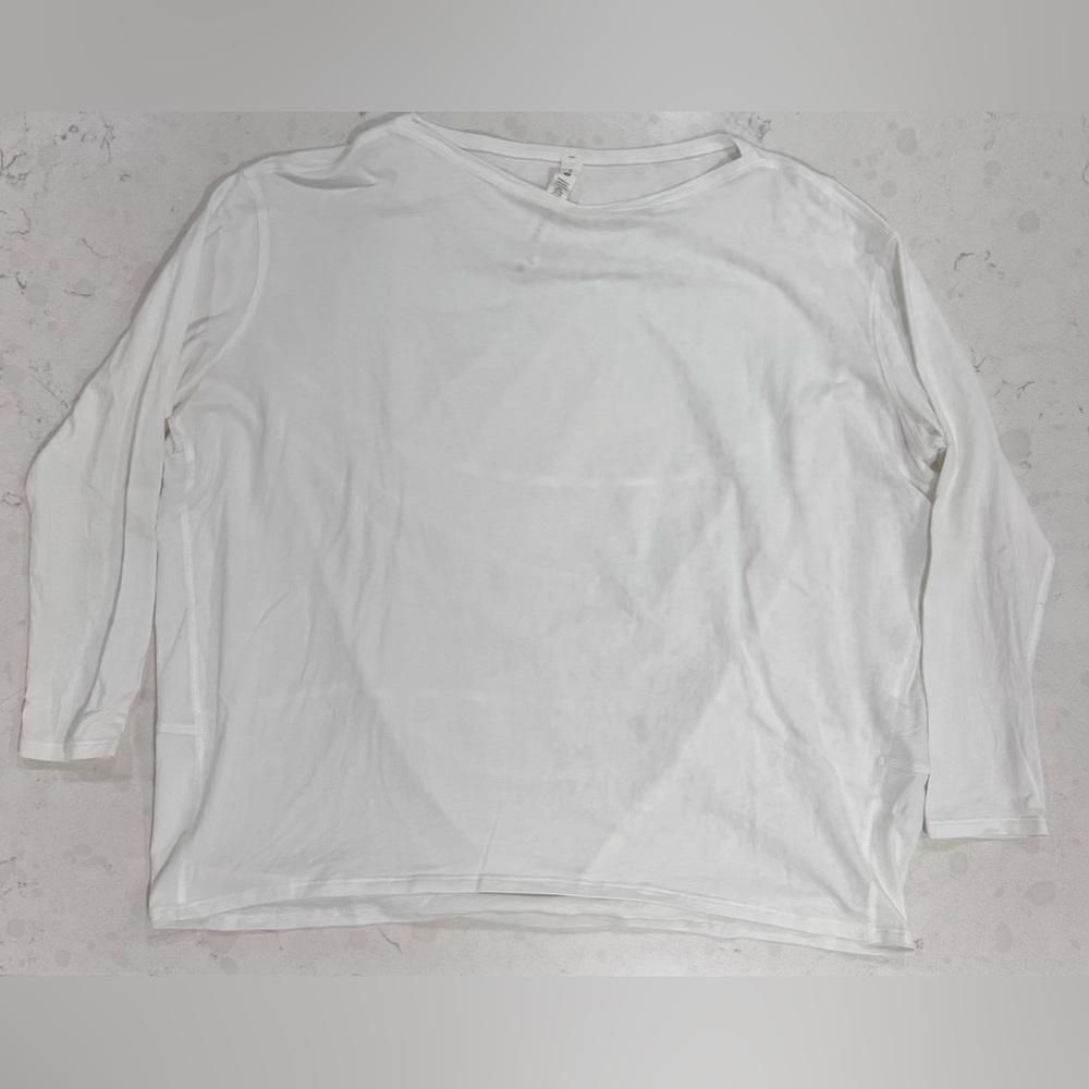 Like new, lululemon Back in Action Long Sleeve in white, size 8